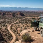 Rugged 4x4 vehicle on a wilderness road trip overlook
