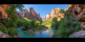 Panoramic view of a serene, untouched natural canyon with a river.